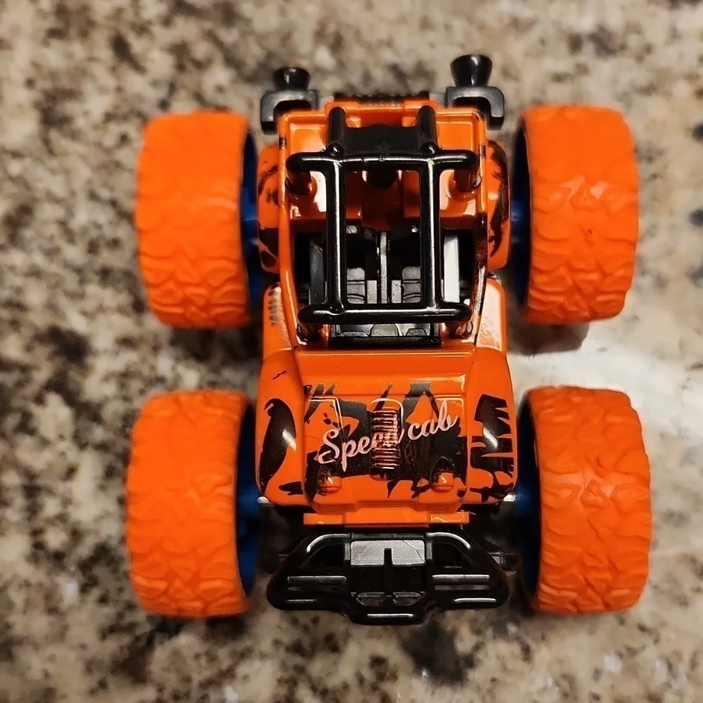Jeep monster truck reve up car orange black